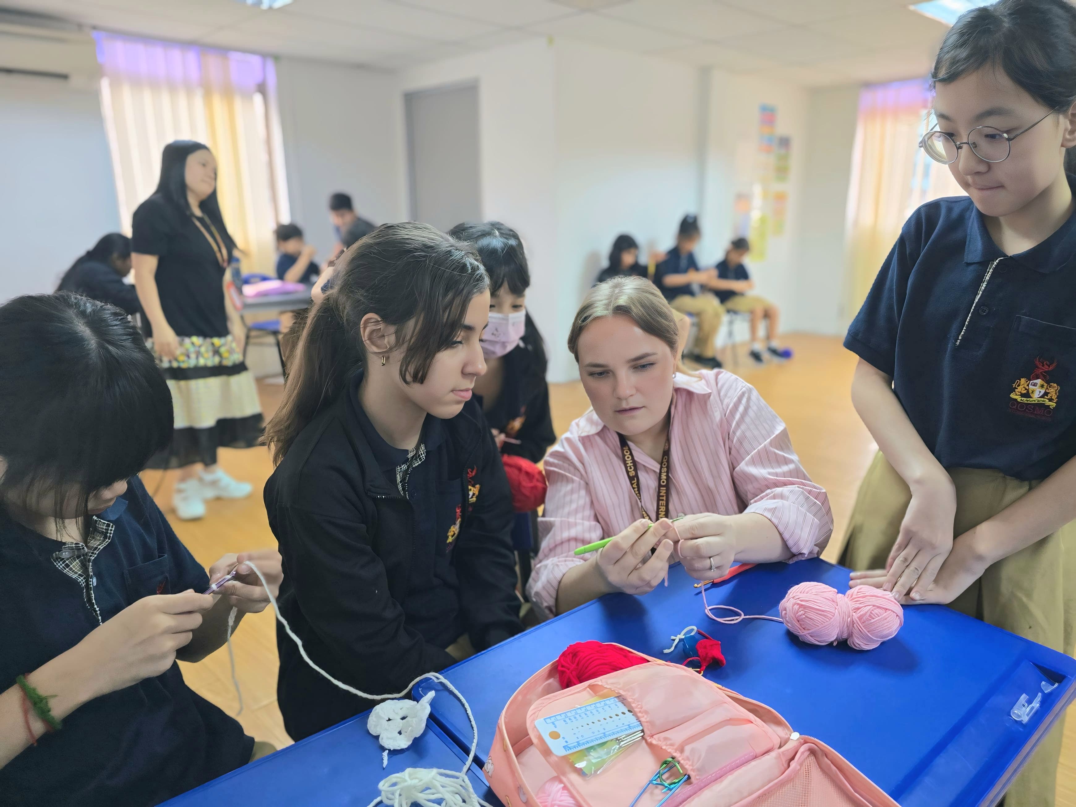 Students supported in a welcoming school environment at Qosmo.
