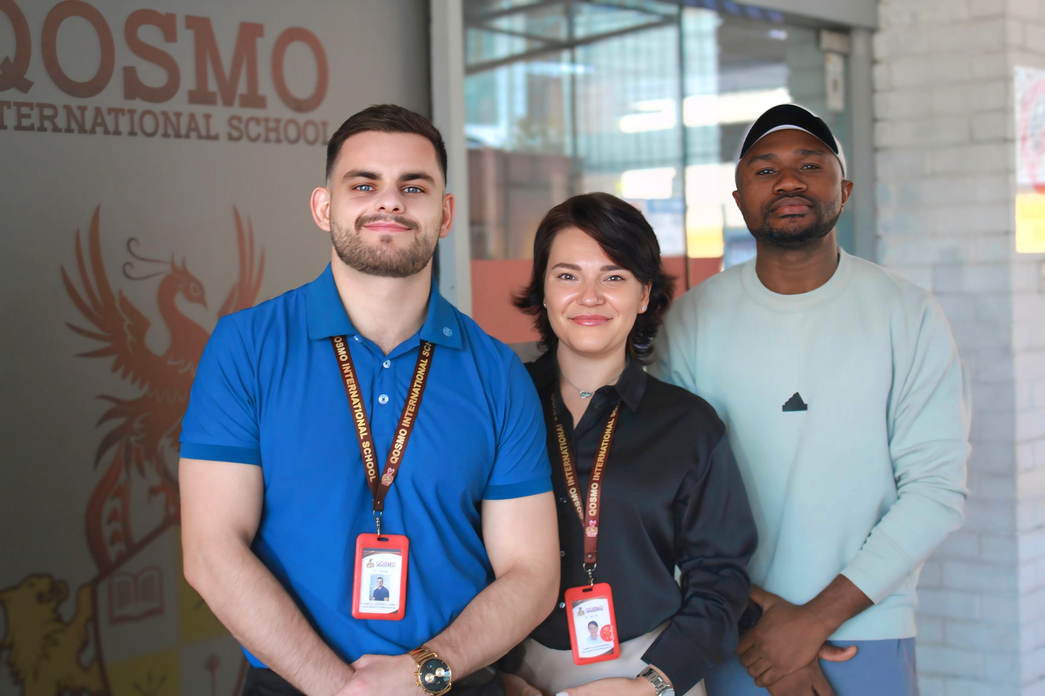 The Qosmo International School team gathered together.